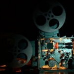 retro-film-festival-movie-film-cinematographic-equipment-show-cinema-hall-to-audience-to-lovers-spectacles-68569514
